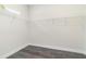 Spacious walk-in closet featuring custom shelving, tile floor, and plenty of storage space at 3777 Sw 130Th Loop, Ocala, FL 34473
