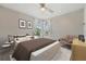 Bedroom with neutral walls, a ceiling fan, and bright natural light at 390 Lake Placid Ct # 304, Altamonte Springs, FL 32701