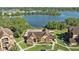 Inviting condo complex featuring lush landscaping and lake views, perfect for tranquil living at 390 Lake Placid Ct # 304, Altamonte Springs, FL 32701