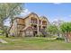 Charming apartment building with balconies, landscaped lawn, and sidewalk access, perfect for comfortable living at 390 Lake Placid Ct # 304, Altamonte Springs, FL 32701