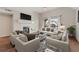 Bright living room featuring a fireplace, modern furnishings, and a view of the outdoor balcony at 390 Lake Placid Ct # 304, Altamonte Springs, FL 32701