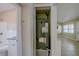 HVAC unit with bathroom and living area views showcases the home's climate control system and interior spaces at 4124 Caywood Cir, Orlando, FL 32810