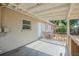 Cozy covered patio with a door leading to the home's interior at 4124 Caywood Cir, Orlando, FL 32810