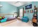 Well-lit bedroom with playful decor and a modern bed frame at 4148 Oak St, Orlando, FL 32814