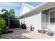 Paver patio featuring a grill, blue umbrella, and basketball hoop at 4148 Oak St, Orlando, FL 32814