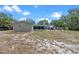 Expansive backyard featuring a patio area and playground, providing ample space for relaxation and play at 424 Eden Park Rd, Altamonte Springs, FL 32714