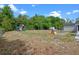 Spacious backyard with playset, perfect for to enjoy outdoor activities and playtime at 424 Eden Park Rd, Altamonte Springs, FL 32714
