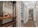 Hallway with rustic bar cart leads to other rooms in the home at 424 Eden Park Rd, Altamonte Springs, FL 32714