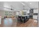 Spacious open-concept kitchen and living room with modern island and seating at 424 Eden Park Rd, Altamonte Springs, FL 32714