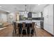 Bright kitchen featuring a large island with barstool seating and modern appliances at 424 Eden Park Rd, Altamonte Springs, FL 32714