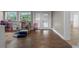 Bright playroom with wood-look tile, lots of natural light, and direct access to the exterior at 424 Eden Park Rd, Altamonte Springs, FL 32714