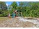 Fun backyard playground with slides, swings, and climbing dome for endless outdoor adventures at 424 Eden Park Rd, Altamonte Springs, FL 32714