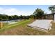 Enjoy this backyard's spacious patio and view of the lake at 51 Spruce Ln, Debary, FL 32713