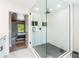 Spacious shower with glass surround and modern fixtures in the bathroom at 51 Spruce Ln, Debary, FL 32713