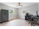 Bedroom featuring natural light, ceiling fan, and wood-look flooring at 51 Spruce Ln, Debary, FL 32713