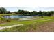 Enjoy this home's view of a serene and peaceful lake at 51 Spruce Ln, Debary, FL 32713