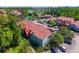 Beautiful exterior of condo building with lush landscaping at 5112 Conroy Rd # 13, Orlando, FL 32811
