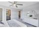 Bedroom with carpet, view to bathroom, and lots of natural light at 5262 Foothills Preserve Loop, Mount Dora, FL 32757