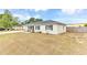 A charming single-story home featuring manicured landscaping and a well-maintained exterior at 5904 Lakewood Ln, Lakeland, FL 33805