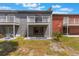View of the backyard from a multi-Gathering building with balconies at 7336 Daniel Webster Dr # 9, Winter Park, FL 32792