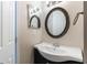 Bathroom with modern vanity, lighting and updated fixtures at 7336 Daniel Webster Dr # 9, Winter Park, FL 32792