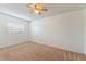 Bedroom featuring a ceiling fan and bright window at 7336 Daniel Webster Dr # 9, Winter Park, FL 32792