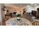 Cozy dining area with an decorative table and open view to the living area at 7415 Devereaux St, Reunion, FL 34747