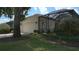 Well-maintained home featuring an attached two-car garage at 7415 Devereaux St, Reunion, FL 34747