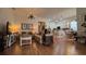 Bright living room featuring hardwood floors and an open floor plan with great natural light at 7415 Devereaux St, Reunion, FL 34747