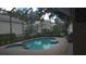 A screened-in pool and spa provide a private outdoor retreat at 7415 Devereaux St, Reunion, FL 34747