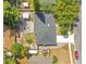 Aerial view of the home featuring a large backyard, patio, mature trees, and a shed at 821 Sutter Loop, Longwood, FL 32750