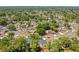 Aerial view showcasing this home nestled in a well-established community with winding streets at 821 Sutter Loop, Longwood, FL 32750