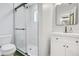 Modern bathroom features glass enclosed shower, stylish vanity, and updated fixtures at 821 Sutter Loop, Longwood, FL 32750
