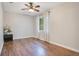 Bedroom with wood floors, single window, and neutral wall paint at 821 Sutter Loop, Longwood, FL 32750