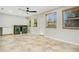 Spacious laundry room features tile floors, natural lighting, and washer and dryer at 821 Sutter Loop, Longwood, FL 32750