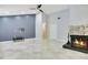 Spacious living room featuring neutral tones, a decorative fireplace, and ample space for furniture and decor at 821 Sutter Loop, Longwood, FL 32750
