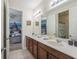 Double vanity bathroom connecting to Star Wars themed room and another bath/shower combo at 9007 Pelican Cove Trce, Kissimmee, FL 34747