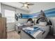 bedroom featuring twin beds with Star Wars themed decor and unique headboards at 9007 Pelican Cove Trce, Kissimmee, FL 34747