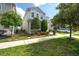 Charming two-story home featuring a well-maintained yard and attached garage at 9007 Pelican Cove Trce, Kissimmee, FL 34747
