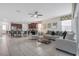 Open-concept living space with a kitchen, living room and dining area at 9007 Pelican Cove Trce, Kissimmee, FL 34747