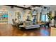 Inviting lobby featuring stylish sofas, accent tables, and elegant decor at 9007 Pelican Cove Trce, Kissimmee, FL 34747