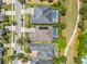 Picturesque aerial view of homes showcasing swimming pools, well-maintained yards, and a peaceful park at 9405 Bordet Ct, Orlando, FL 32827
