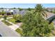 Beautiful home featuring a lush green lawn, mature trees, and a well-maintained landscape in a peaceful neighborhood at 9405 Bordet Ct, Orlando, FL 32827