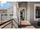 Stylish home exterior with an inviting open doorway and a glimpse of the interior at 9405 Bordet Ct, Orlando, FL 32827