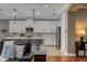 Modern kitchen featuring white cabinetry, center island, and recessed lighting at 9405 Bordet Ct, Orlando, FL 32827