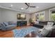 Spacious living room with sleek furniture and lots of natural light at 9405 Bordet Ct, Orlando, FL 32827
