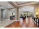 Open living space featuring hardwood floors and neutral paint tones at 9405 Bordet Ct, Orlando, FL 32827