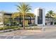 Exterior of a modern restaurant with palm trees and stylish architecture, complemented by attractive landscaping at 9405 Bordet Ct, Orlando, FL 32827
