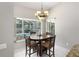 Cozy breakfast nook with views of the screened-in pool area at 115 Oak Grove Cir, Lake Mary, FL 32746