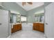 Bright bathroom with large vanity, a walk-in shower, and a tub at 115 Oak Grove Cir, Lake Mary, FL 32746